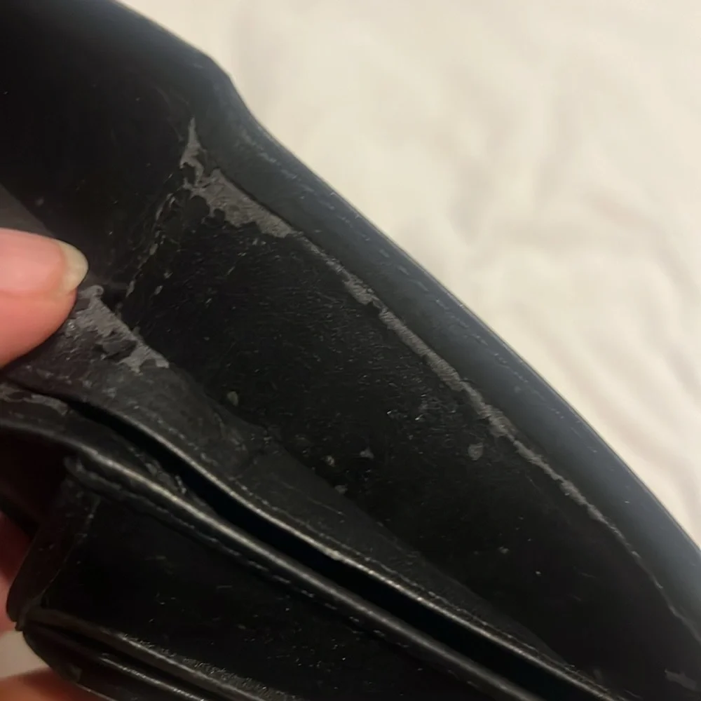 Kenneth Cole mens black butter soft leather bi-fold wallet